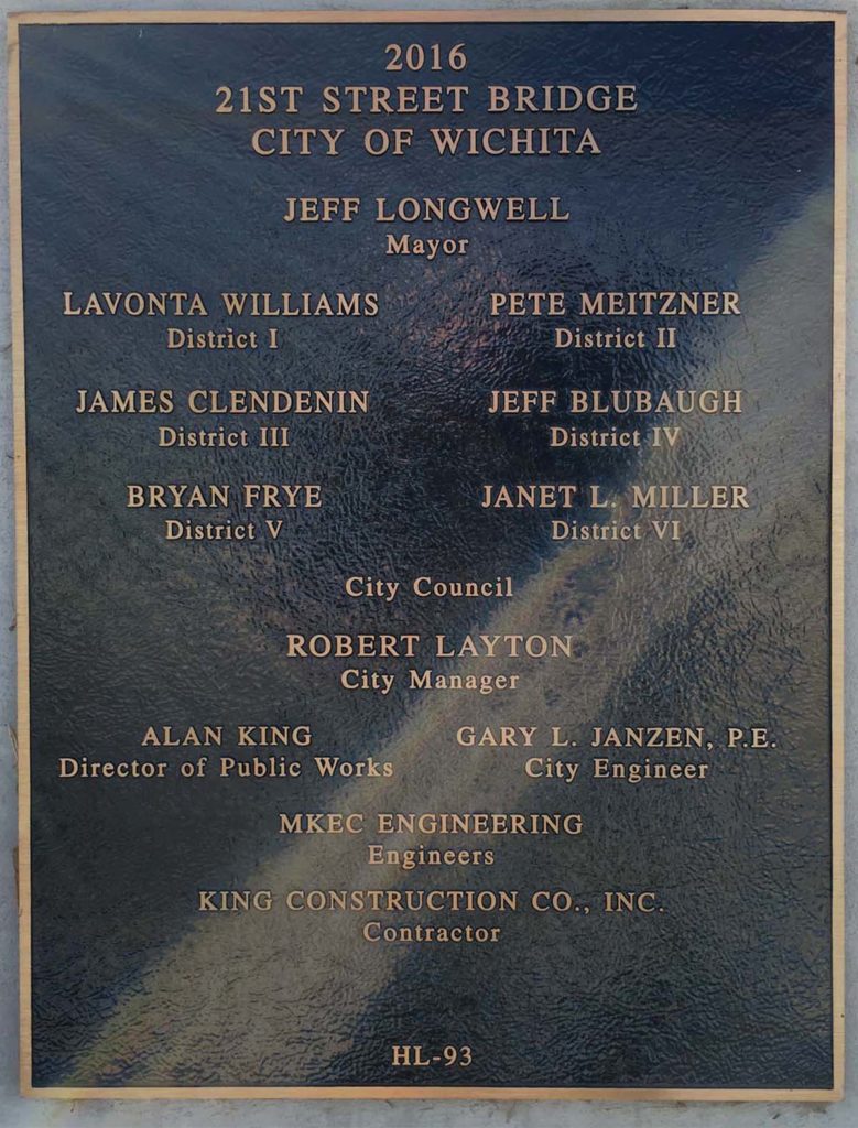 The memorial plaque celebrating the accomplishment on East Twenty-First Street in Wichita. The flare from the sun is a defect of this photograph, not the marker. Click for larger.